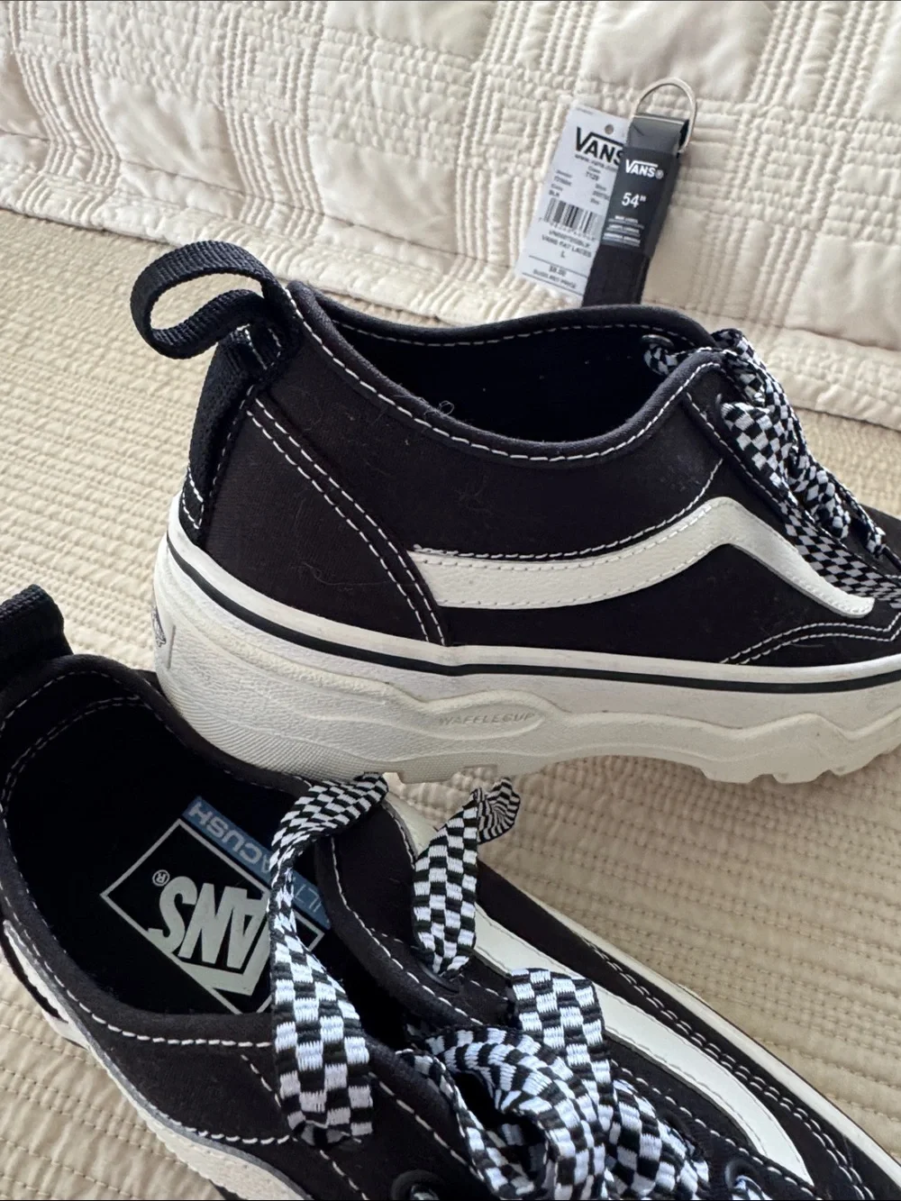 Vans Black and White Checkerboard Laced Sneakers